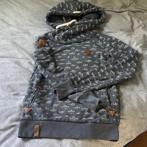 Naketano Blue Hoodie with White Boat Pattern and Brown Owl Patch